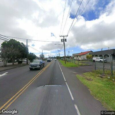 Unresponsive person lying near bus stop in Waimea