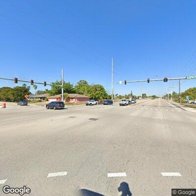 Vehicle rollover with person trapped at intersection