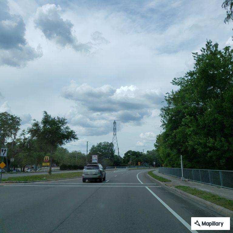 Disabled vehicle with flat tires on South Mobley Road