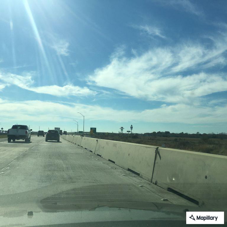 Traffic hazard with vehicle fire on US 59