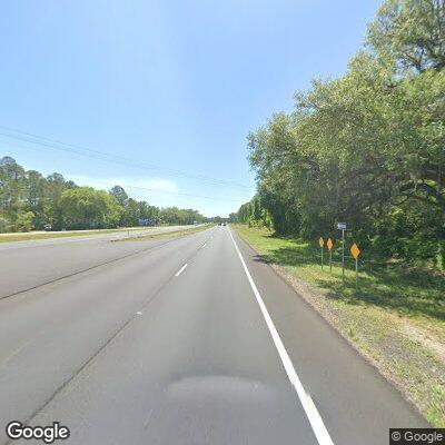 Suspicious black sedan with no lights on highway
