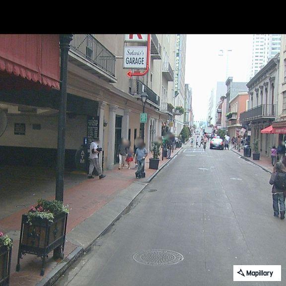 Man vomiting blood on Bourbon Street in New Orleans