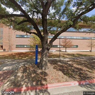 Officer checks open door at campus building