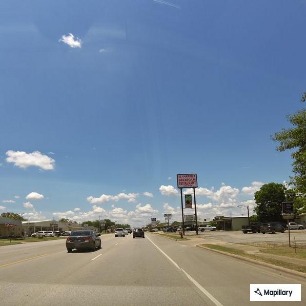 Truck driver threw water bottle at another motorist