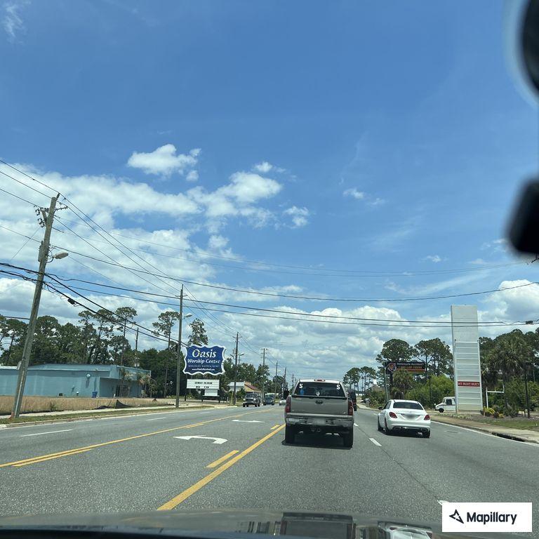 Traffic collision with injured man on Front Beach Road