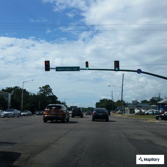 Female falls out of car, awake and breathing at Bienville Blvd
