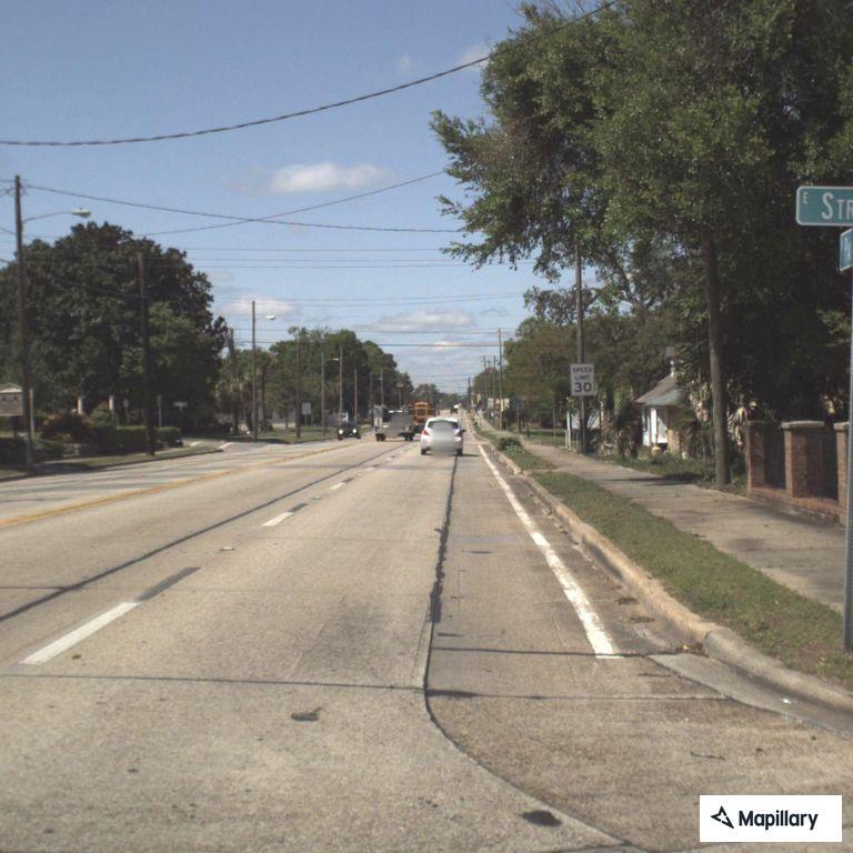 Motorcycle crash with leg injury on West Strong Street