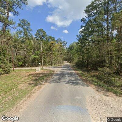 Small woman walking on road near County Roads 5138 and 5117
