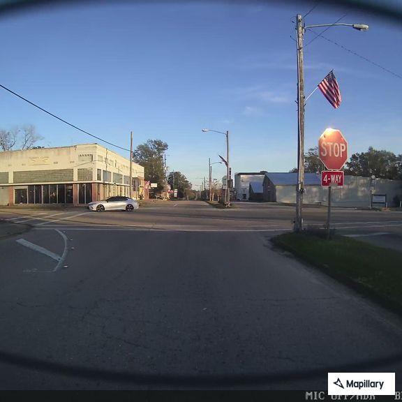 Disabled car at Highway 11 and West Main