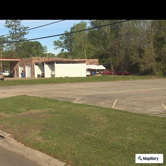 Oversized truck with dozer on LA 8 near Leesville