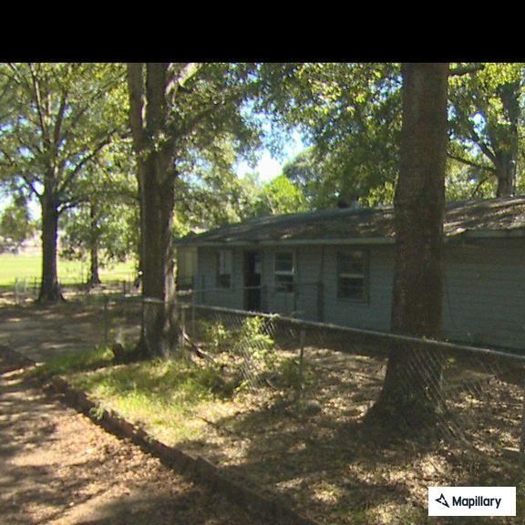 Woman trying to break in back door of home
