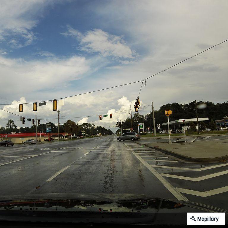 Disabled vehicle blocking roadway at Airport Road