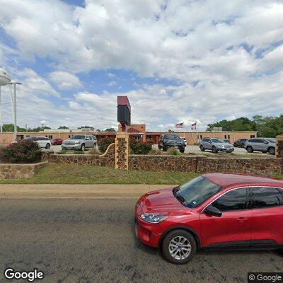 Person experiencing chest pains at sports center parking lot