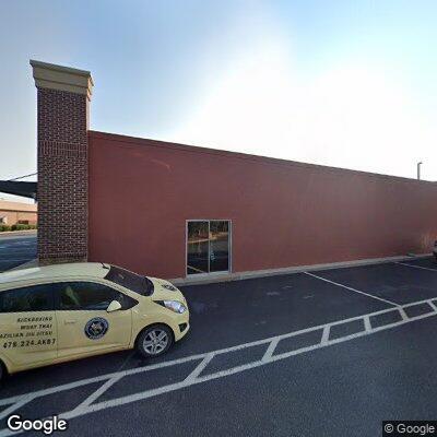 Person stuck in wheelchair under wall fixture at store