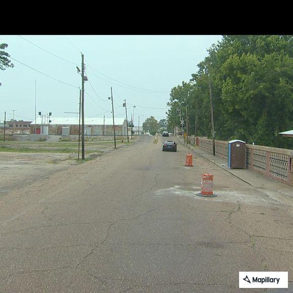 Vehicle windshield damaged near railroad crossing