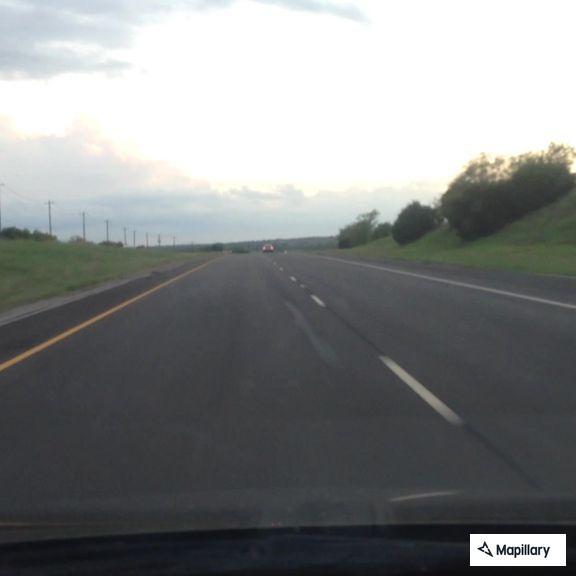 Driver swerving in dark pickup on Highway 377