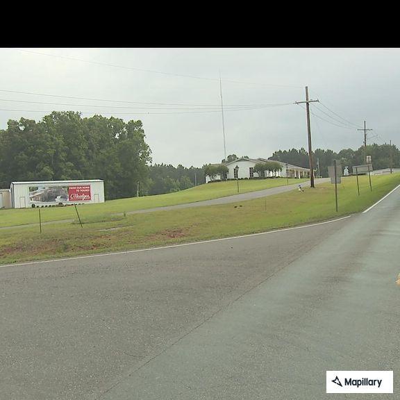 Suspicious pickup with unreadable tag on trailer