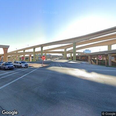 Person standing in freeway median creating hazard
