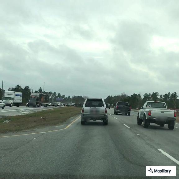 Reckless Cadillac Escalade reported on US 52