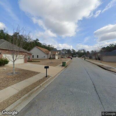 Four masked men walking through subdivision