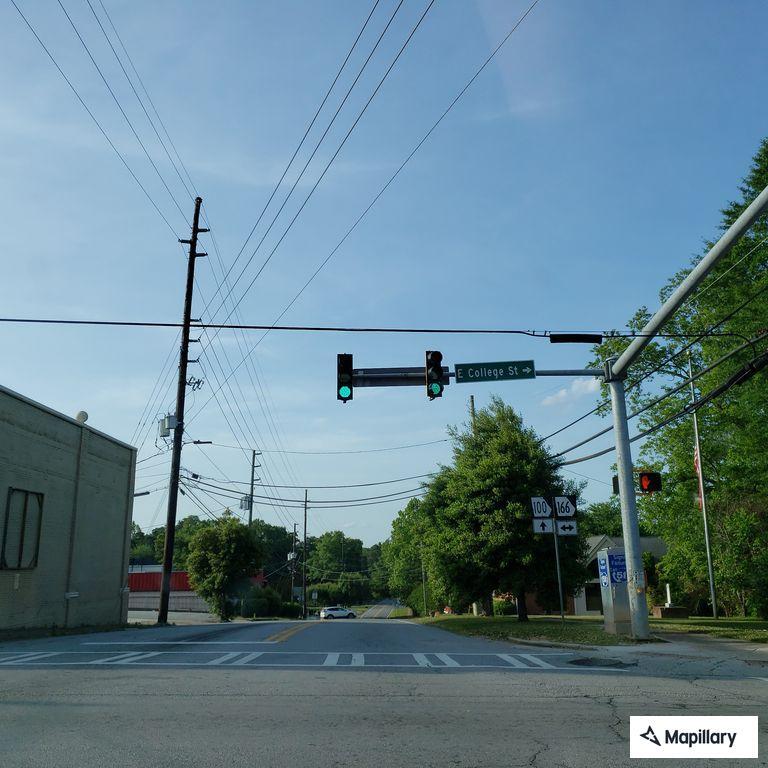 Gray pickup stopped at West College and North Carroll