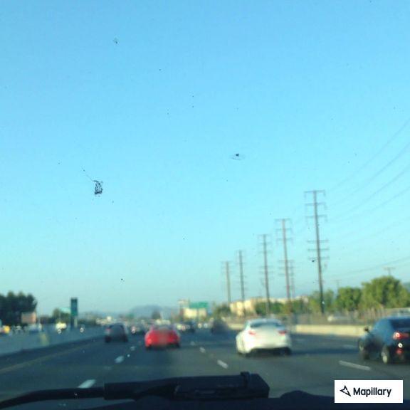 White BMW stopped on CA-55 after running out of gas