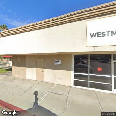 Car crashes into commercial building on Western Avenue