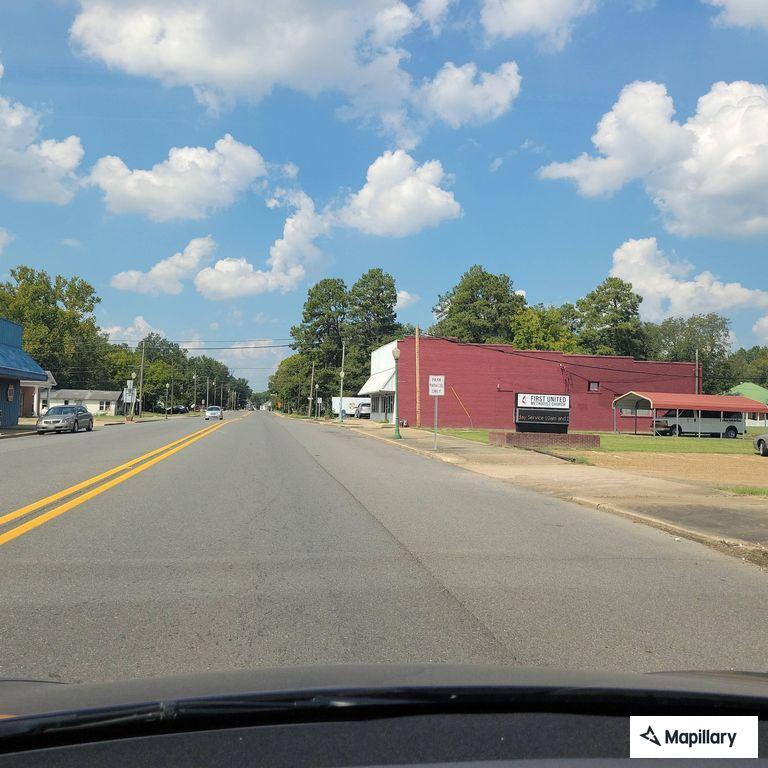 Female patient found lying in road in Prescott