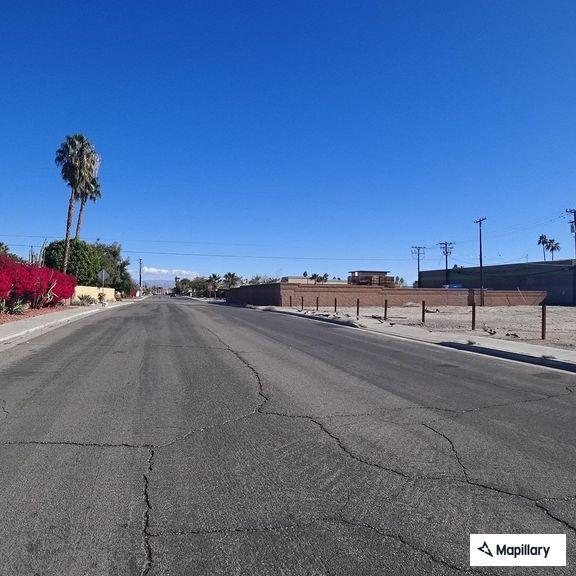 Person experiencing abdominal pain near Aliso Road