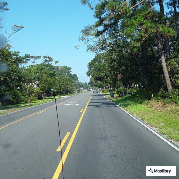 Alligator reported in road on East Oak Island Drive