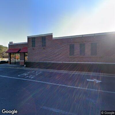 Woman with stitch pain at Alpharetta restaurant