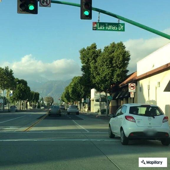 Person feeling sick at bus stop in Temple City
