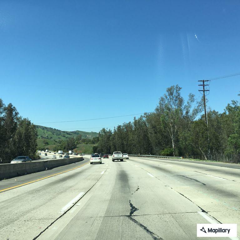 Reckless driver in white Toyota Corolla on US-101