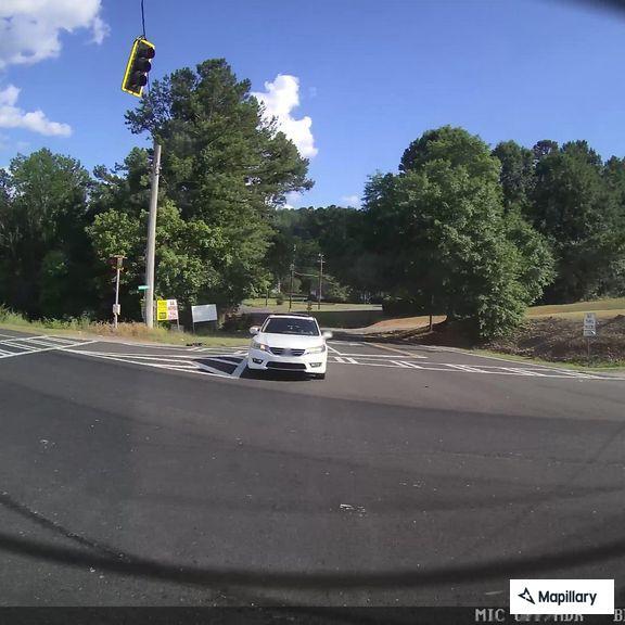 Police stop gold Infiniti SUV near Highway 411