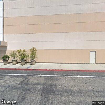Person experiencing back pain at Macy's main entrance