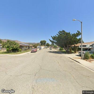Burning trash reported near Oliver Street in Fillmore