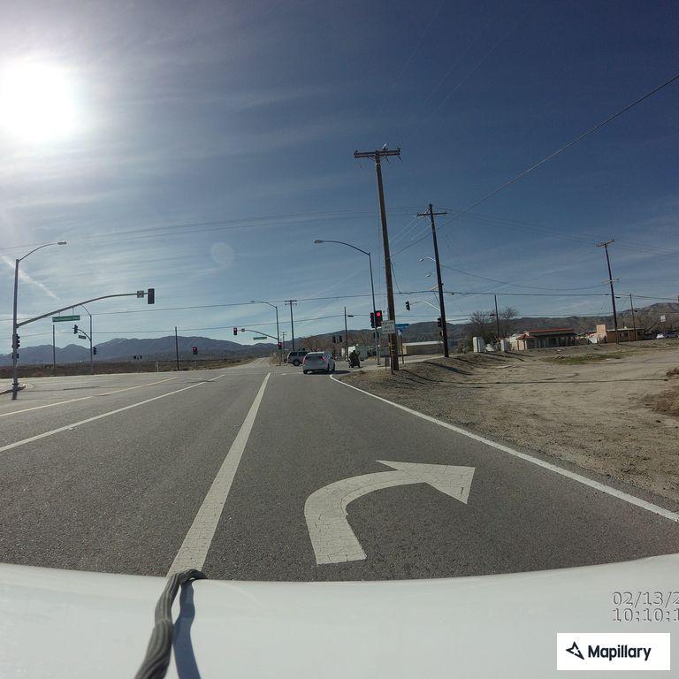 Semi truck partially blocking lane near Dollar Tree