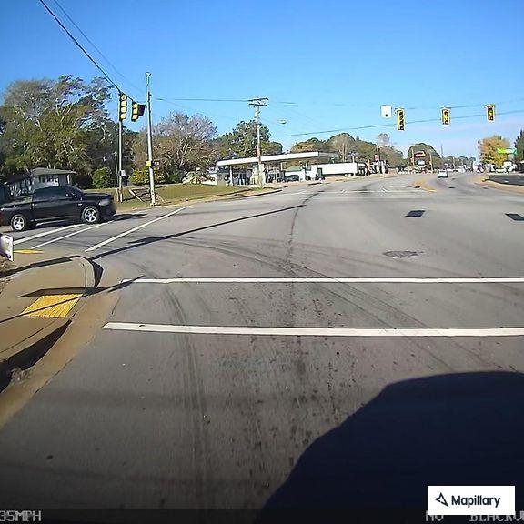 Traffic stop on moped at West Oak and East Main
