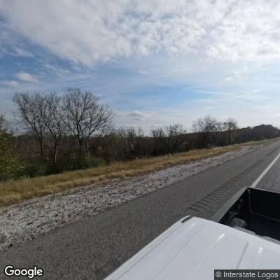 Officer assists driver with flat tire on Highway 69