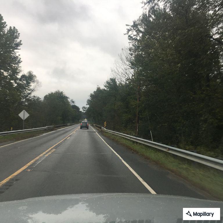 Debris and sandbags blocking US 64 near Morgan Road