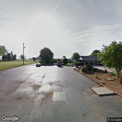 Person with headache near Sugar Hill Road