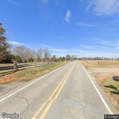 Elderly man walking in road on Third Creek Church Rd