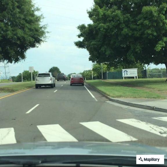 Two vehicles blocking road after crash