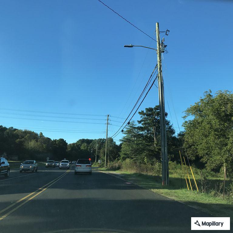 Minor injury crash involving Nissan near intersection