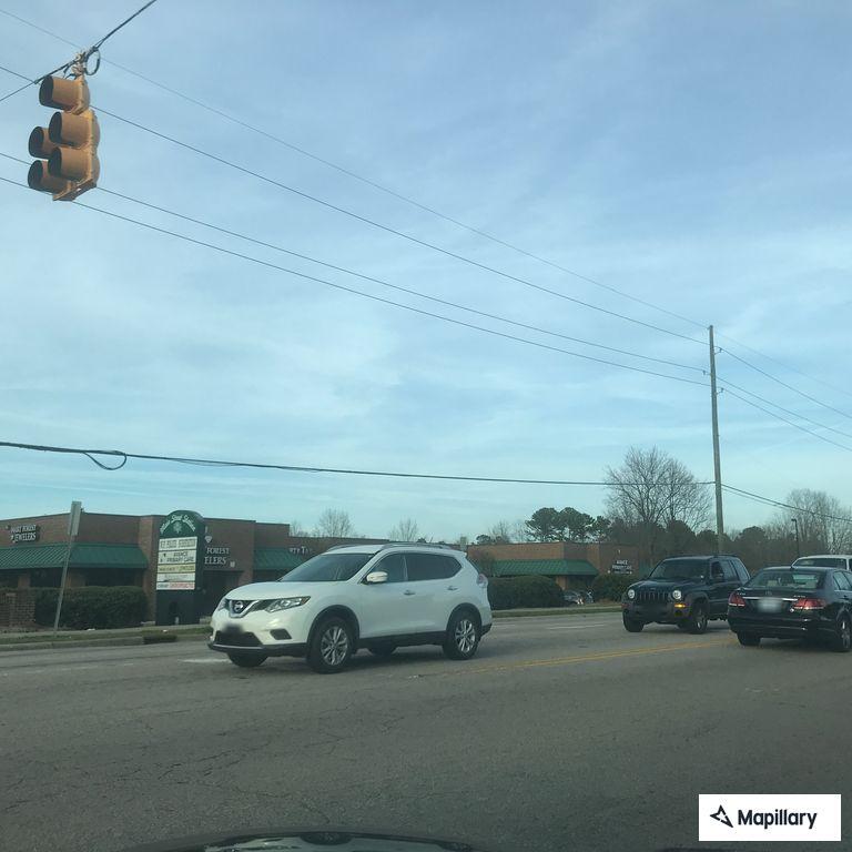 Report of suspicious purple car near Walmart