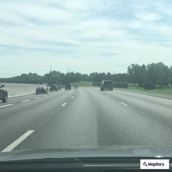 Vehicle with flat tire on I-65 right shoulder