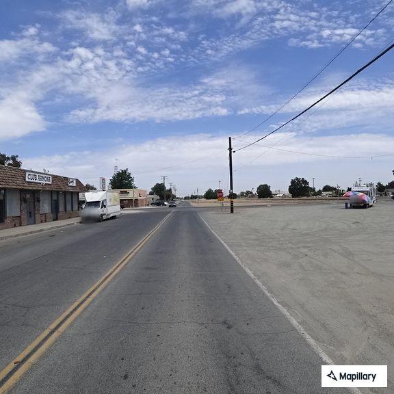 Person rolling in street possibly intoxicated
