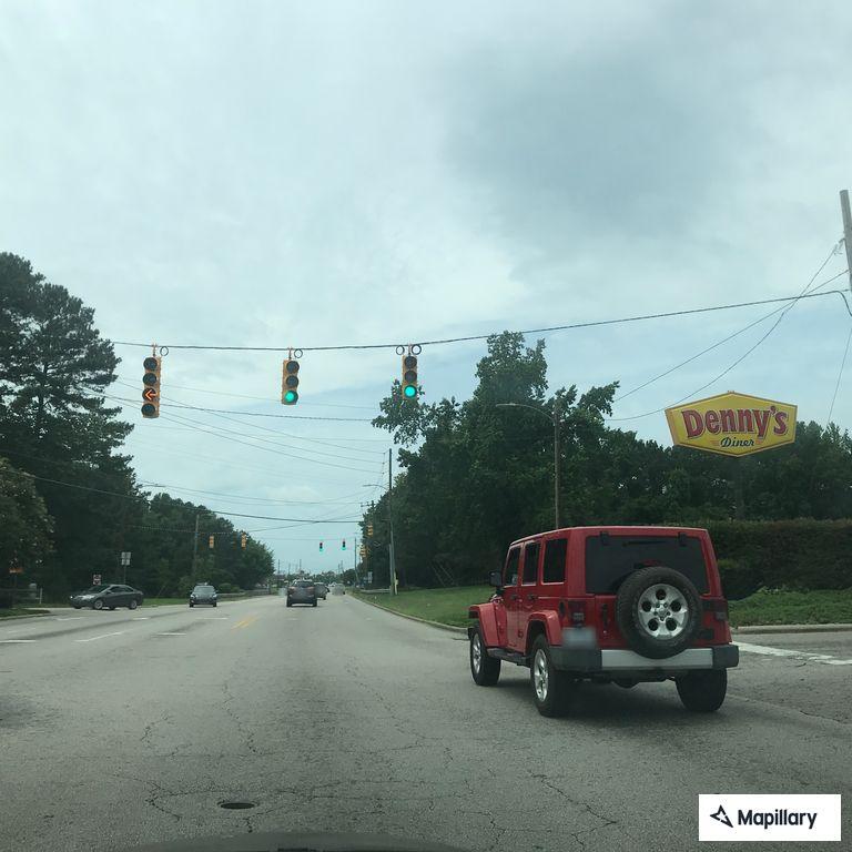 Vehicle hits street sign and fire hydrant