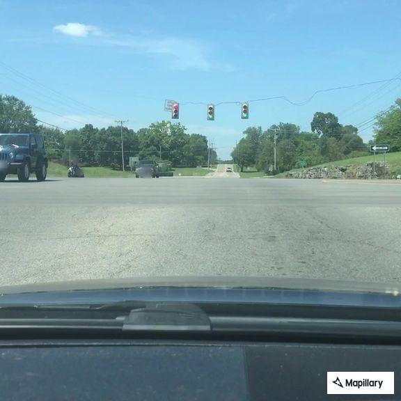 Traffic stop on red Ford F-150 at Highway 109