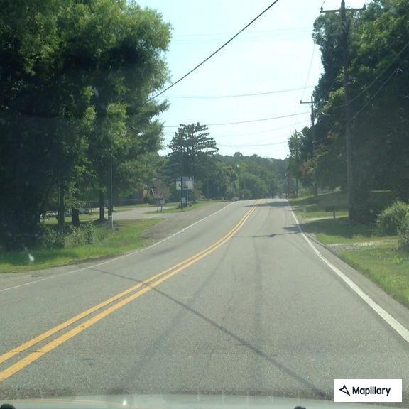 Debris and broken glass blocking roadway